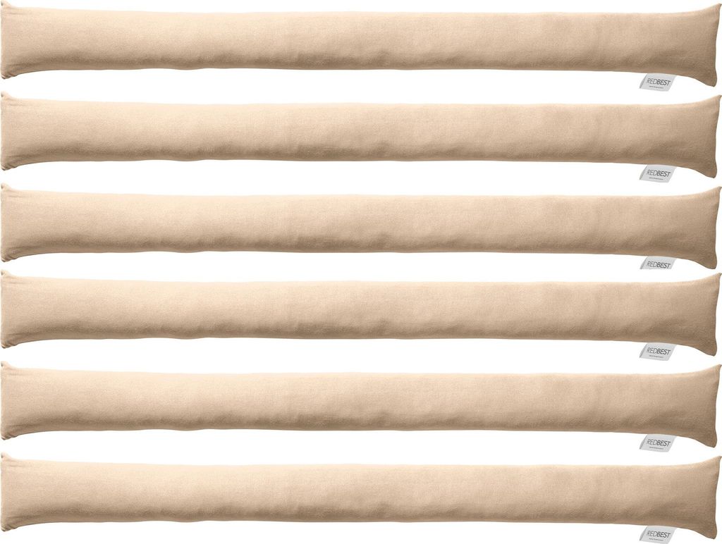 Multiple beige fabric draft stoppers laid out horizontally against a white background.