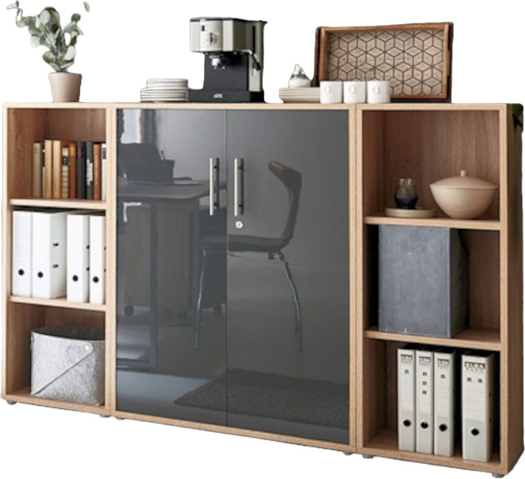 A modern office cabinet with a coffee machine and decorative items on top.