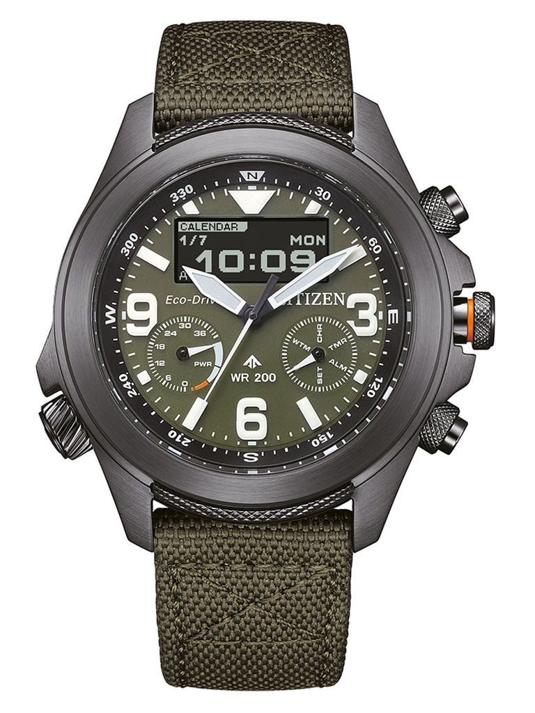 A close-up, front-facing studio shot of a Citizen Promaster watch with a green dial and strap.