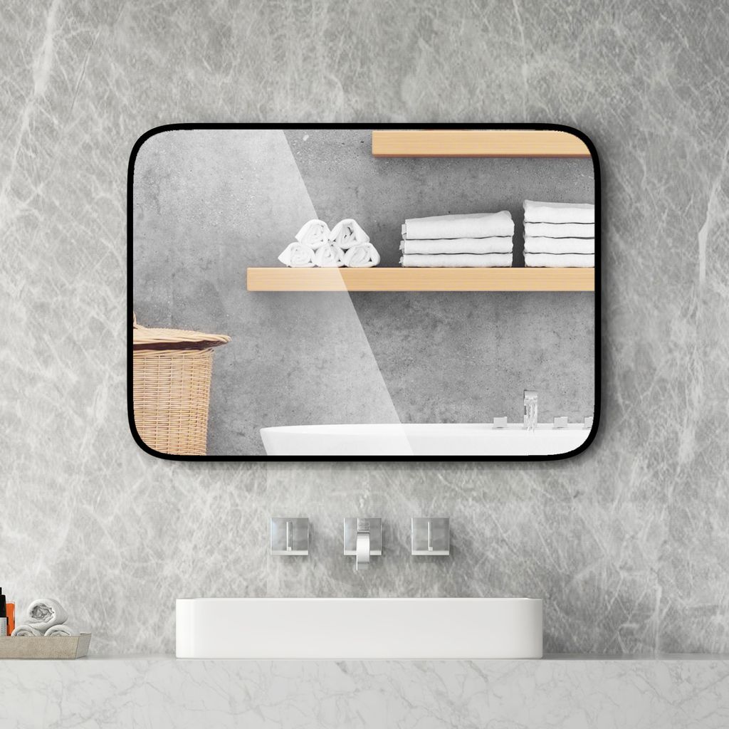 A bathroom scene with a mirror reflecting shelves and towels, and a sink below.