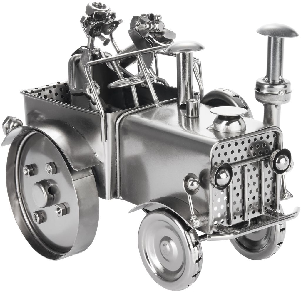A metal sculpture of a tractor with two figures and a dog.