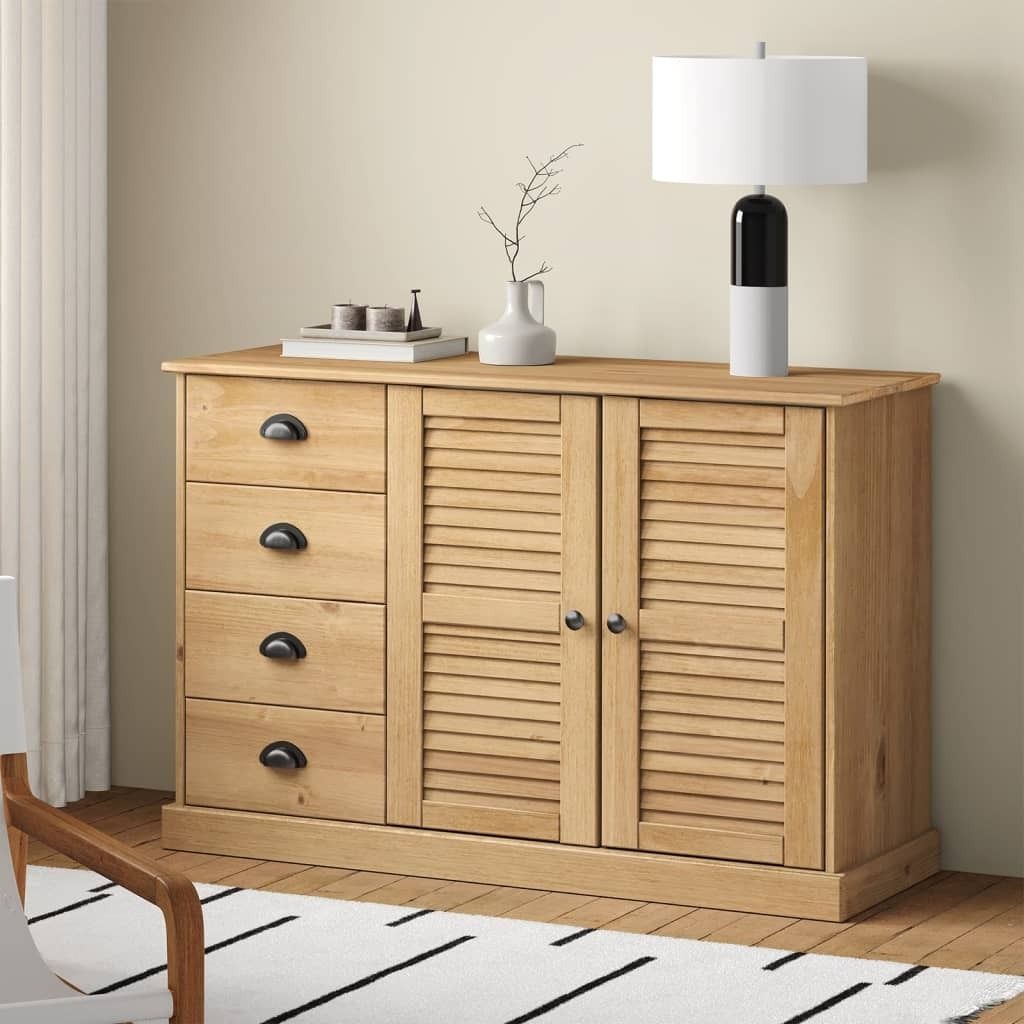 A wooden sideboard with drawers and louvered doors, placed against a light-colored wall.