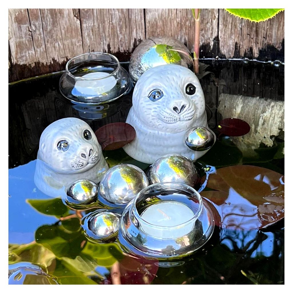 Deko-Set Seehundköpfe mit Schwimmkugeln - Teichkugeln und Teelichtschalen