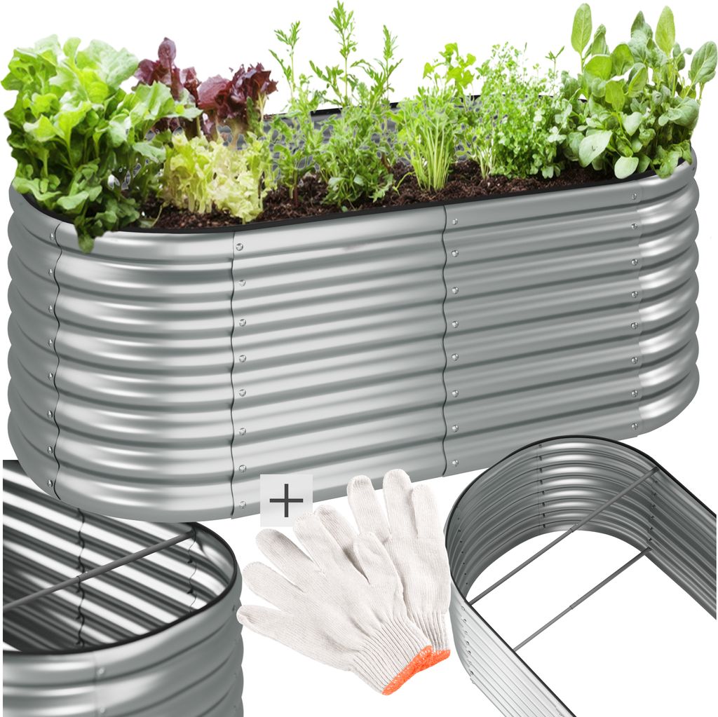 A raised garden bed filled with plants, along with gardening gloves and a part of the raised bed kit.