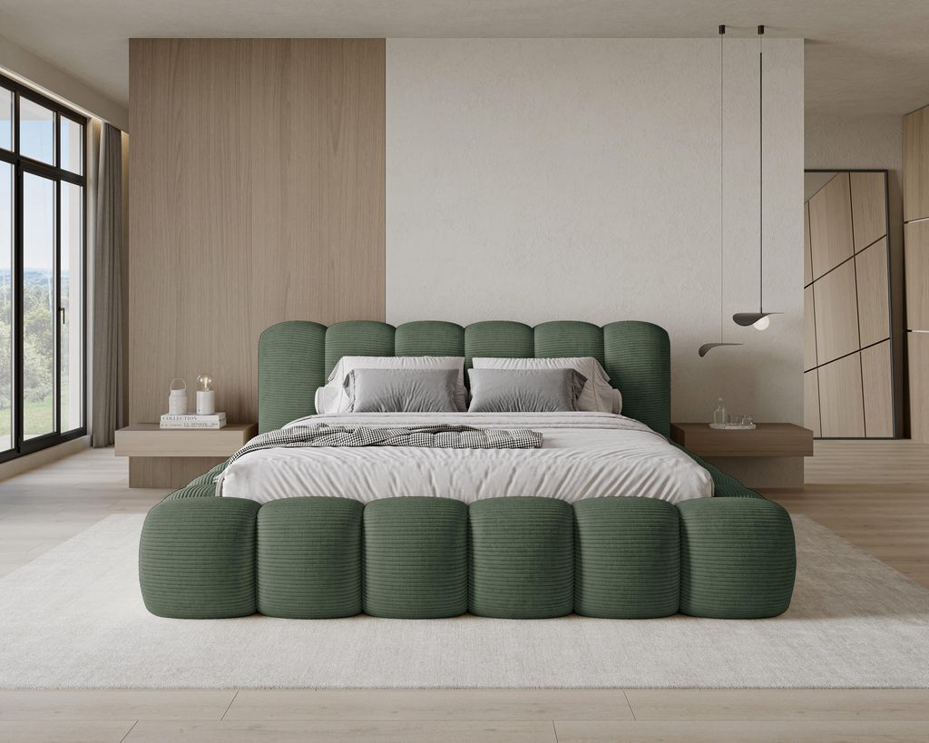 A modern bedroom with a green upholstered bed as the focal point.