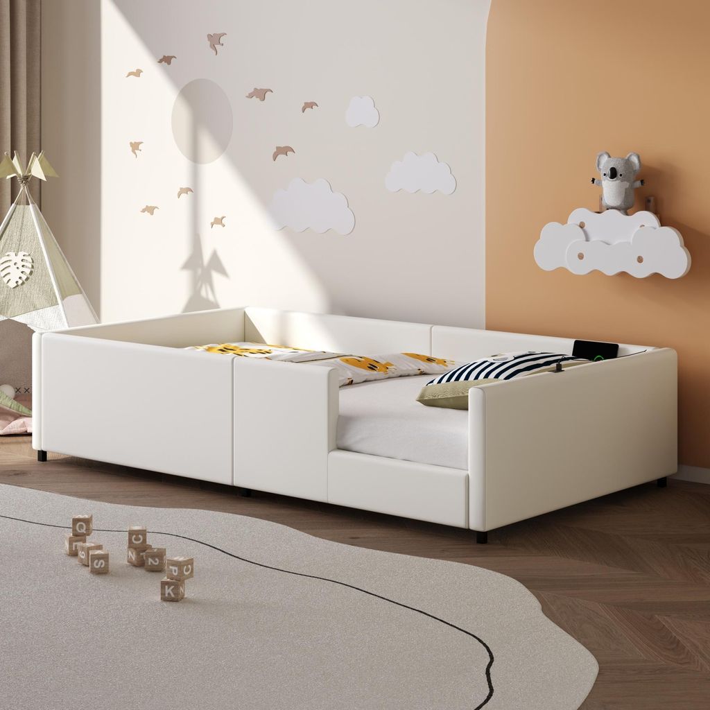 A child's bedroom with a white bed, toys, and wall decorations.