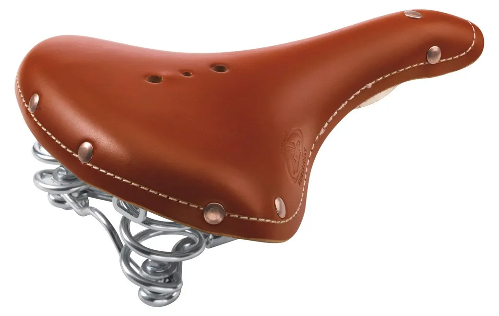 Selle de vélo vintage en cuir cognac à ressorts pour cyclisme urbain chic