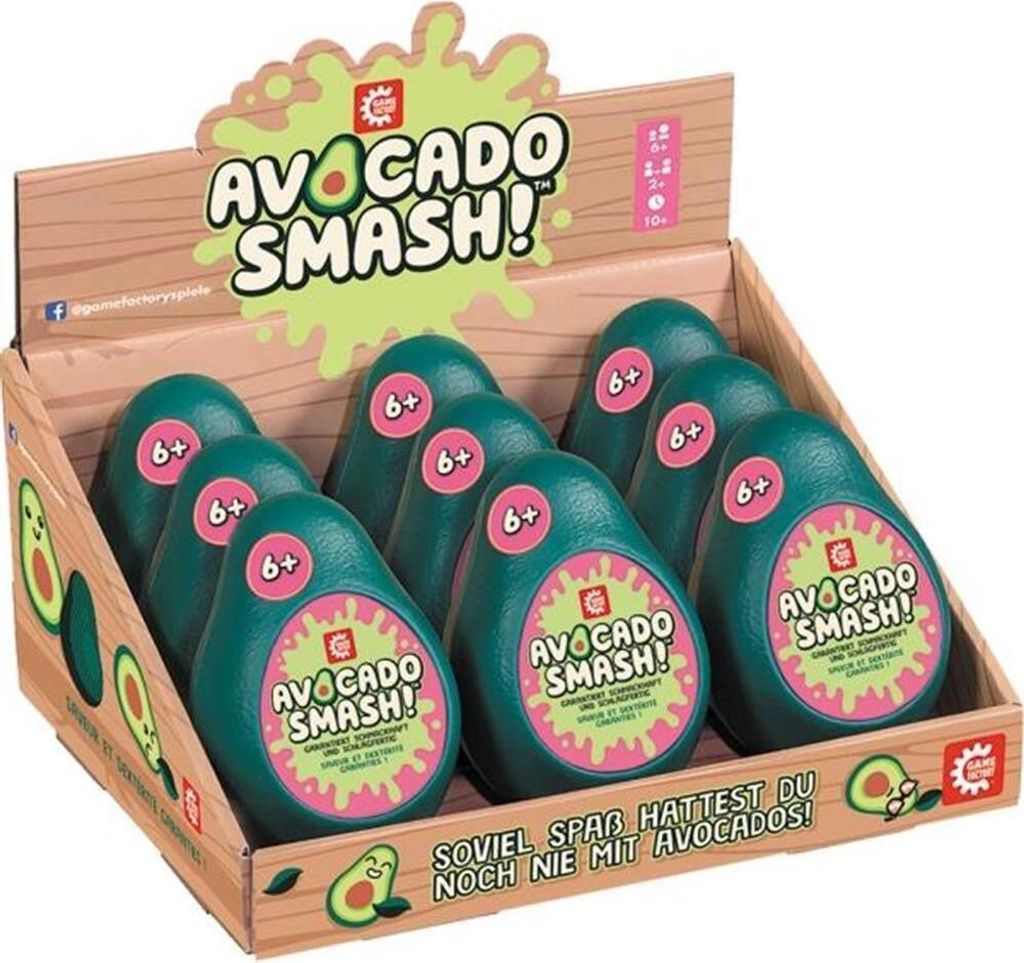 A display box filled with avocado-shaped toys, with the product name and slogan visible.
