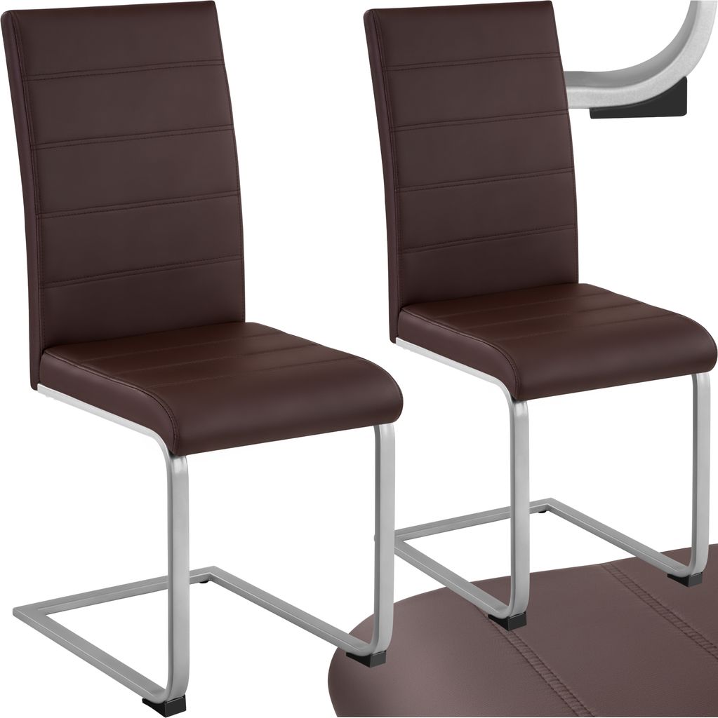 Two brown upholstered dining chairs with silver metal frames are shown against a white background.