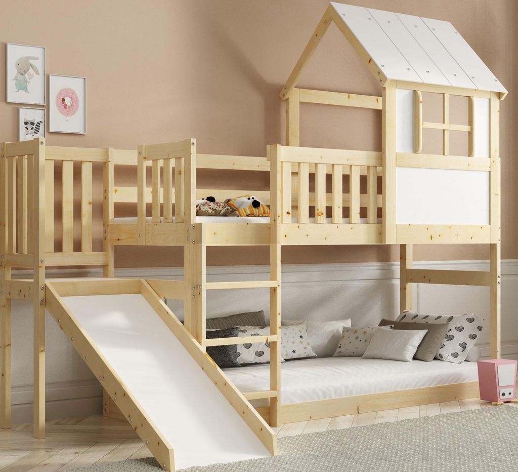 A wooden bunk bed with a slide and a house-like structure on top, set in a child's bedroom.