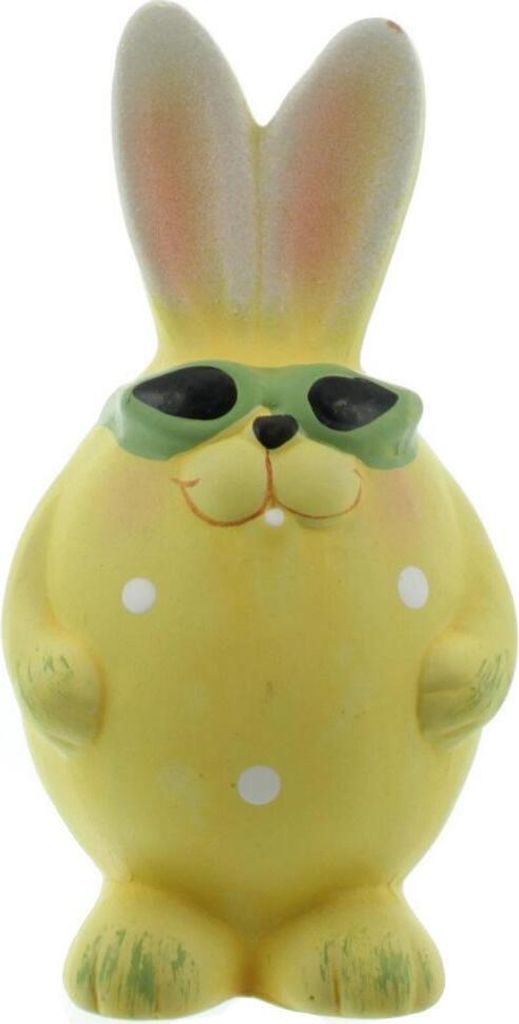 A yellow ceramic Easter bunny figurine wearing sunglasses.