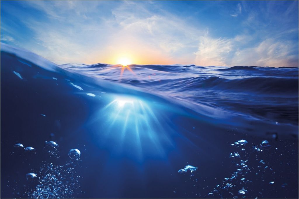 Wallario Poster - Wellen im Meer bei Sonnenuntergang, Kunstdruck Größe: 100 x 150 cm