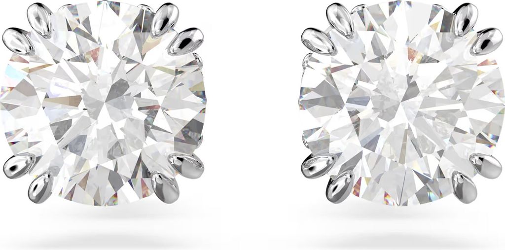 A pair of diamond stud earrings on a white background.