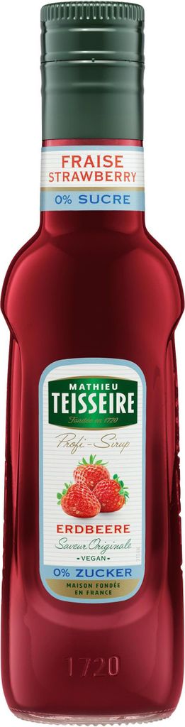 A bottle of strawberry syrup with a label.