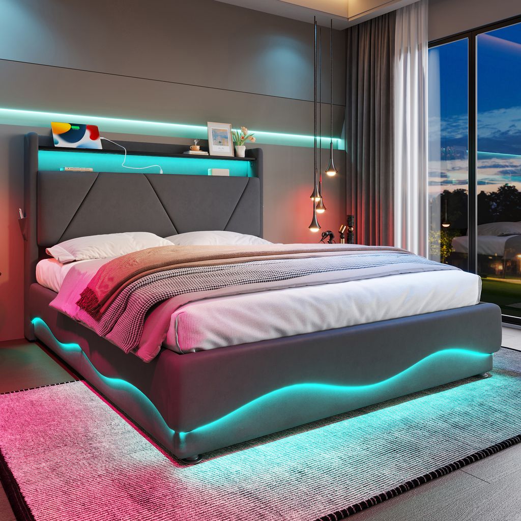 A modern bed with integrated LED lighting and a headboard shelf.