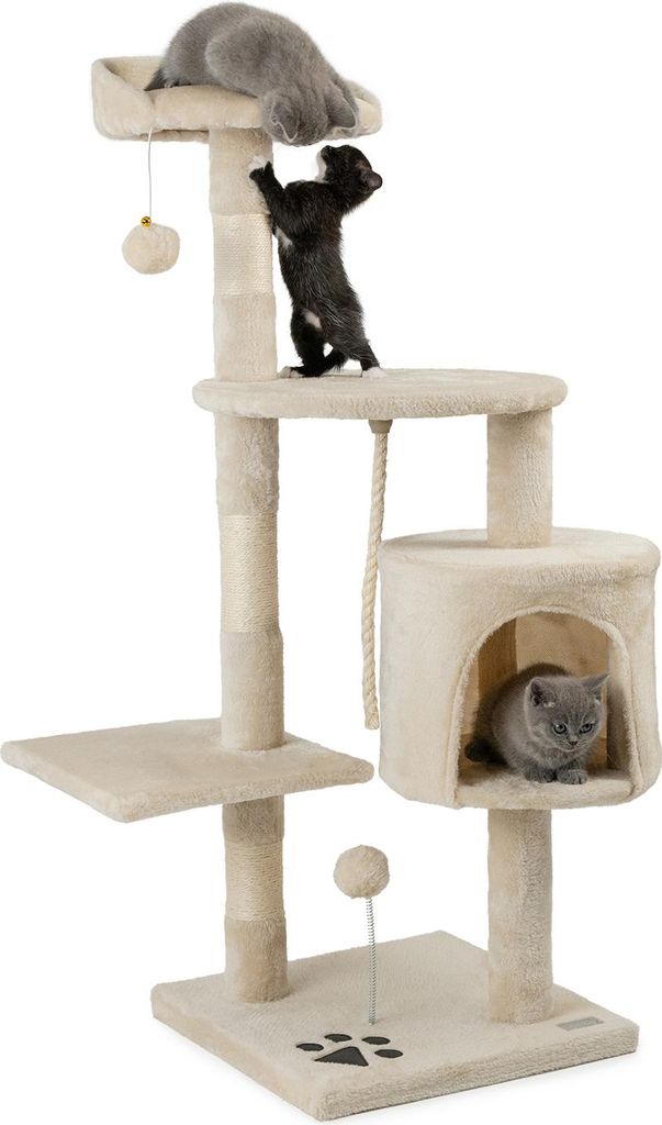Three kittens playing on a multi-level cat tree.