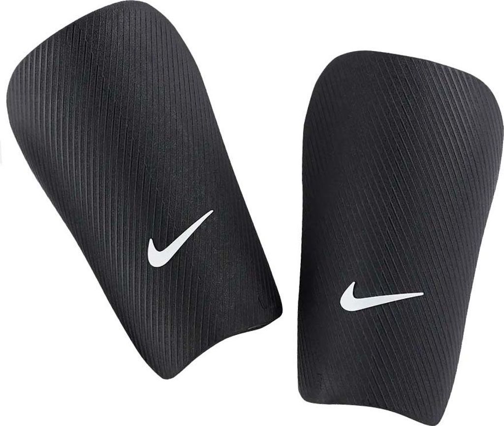 A pair of black Nike shin guards with white Nike logos.