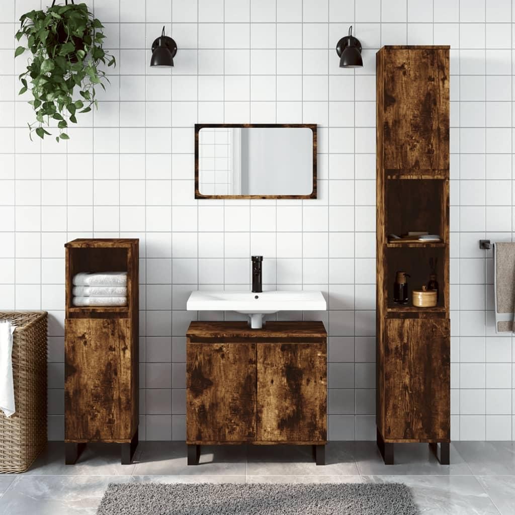 A bathroom vanity set with cabinets and a sink against a tiled wall.