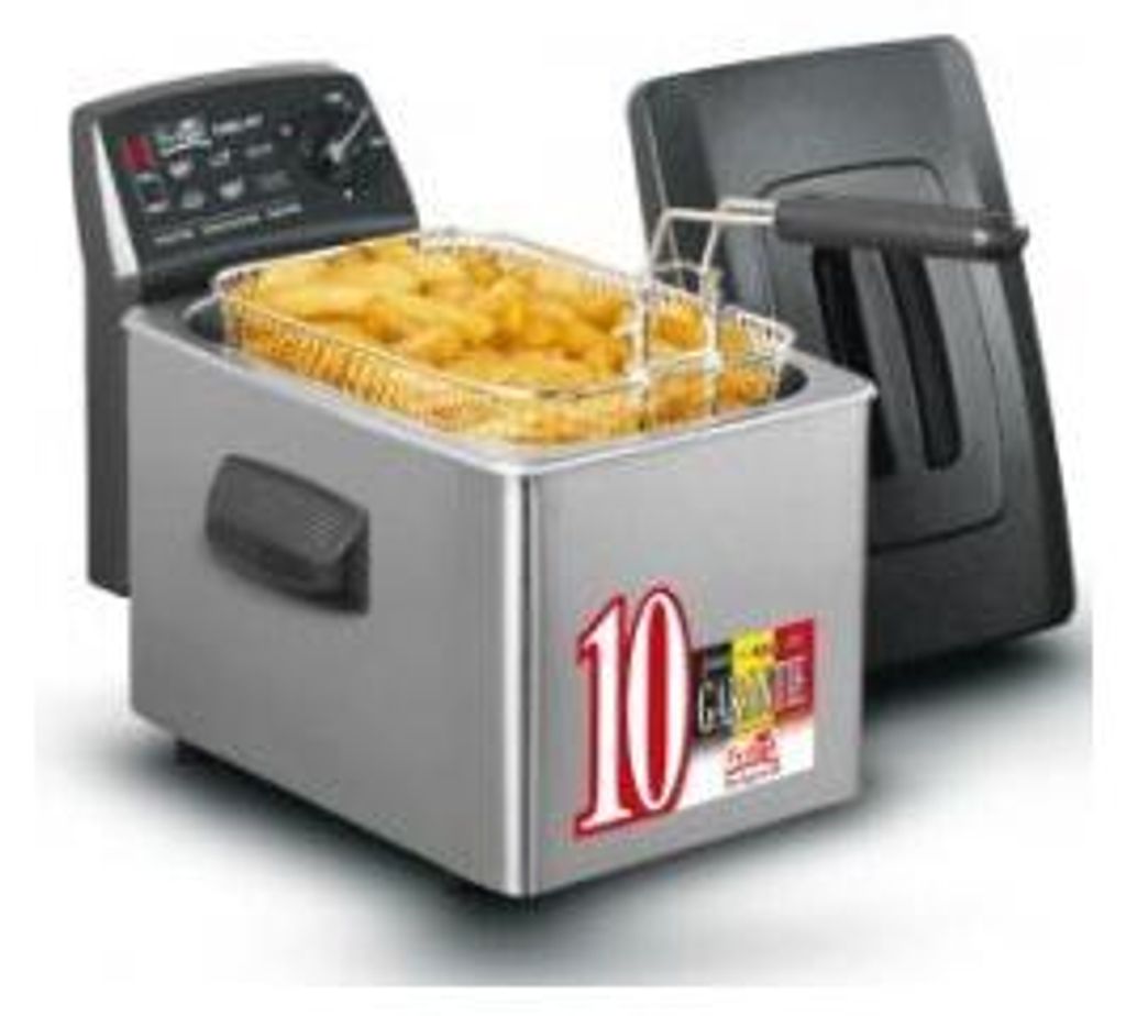 A deep fryer filled with french fries, with its lid and control panel visible.