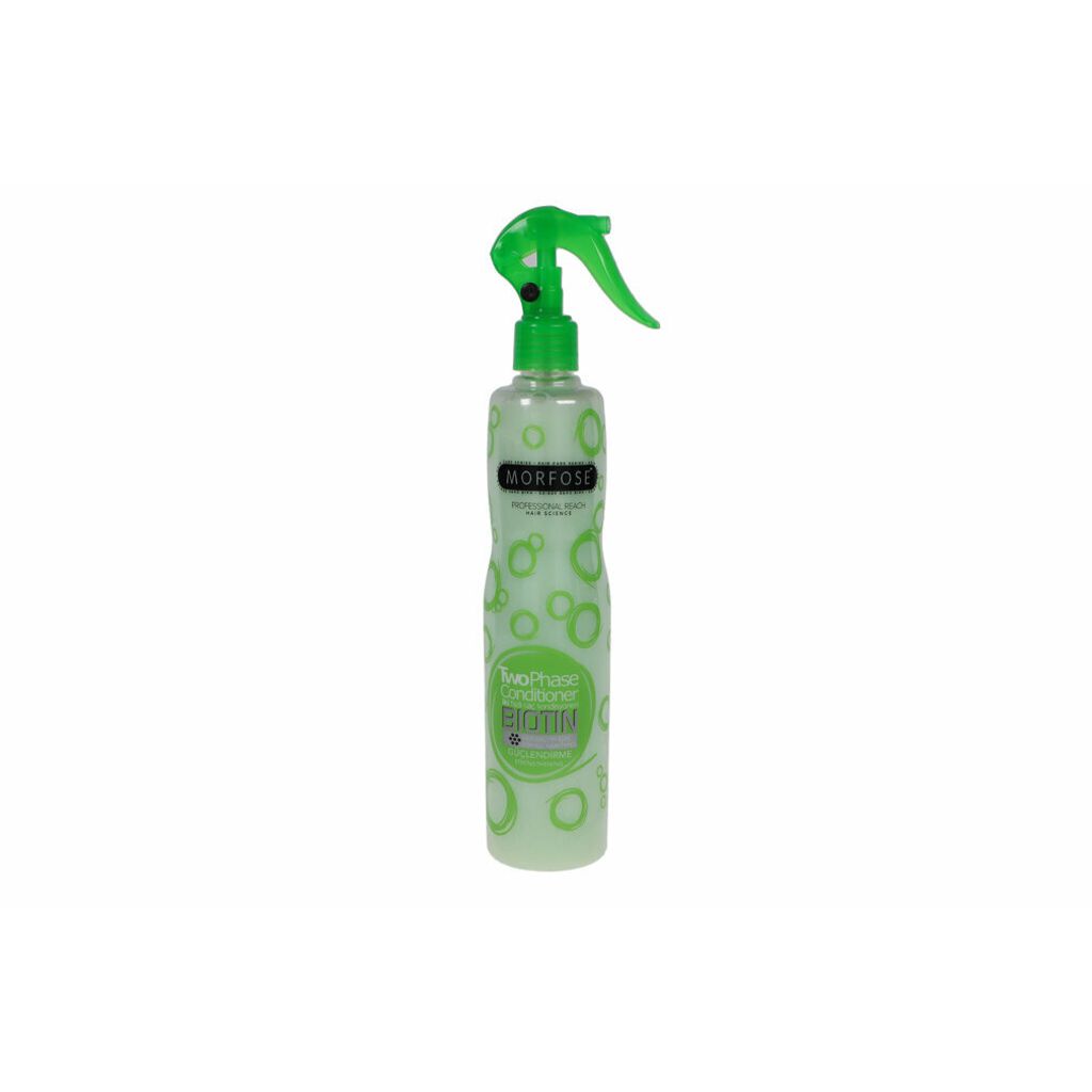 A bottle of hair conditioner with a spray nozzle.