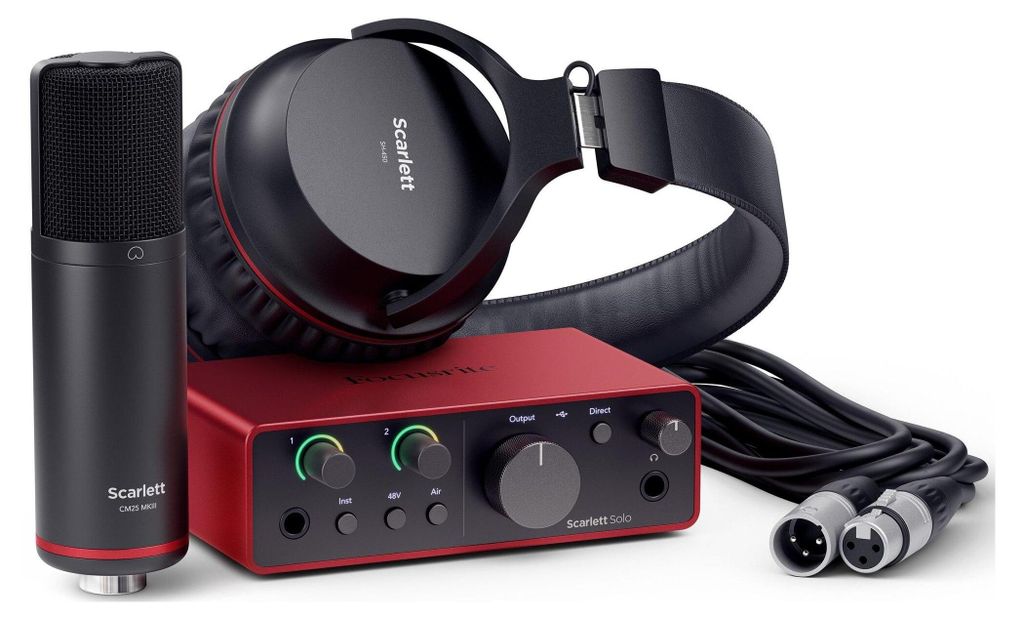 A studio recording kit including a microphone, headphones, and audio interface.