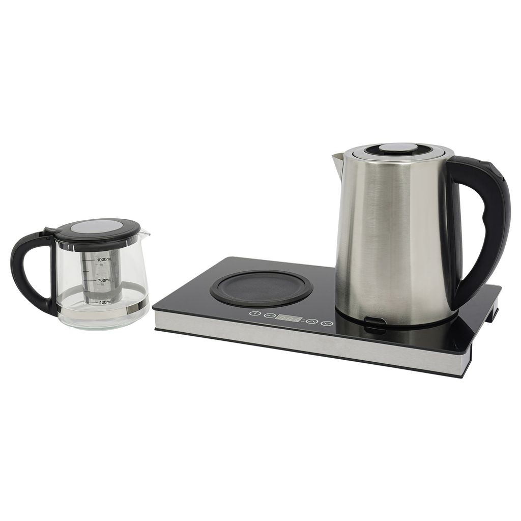 A glass teapot and an electric kettle are placed on an induction heating base.