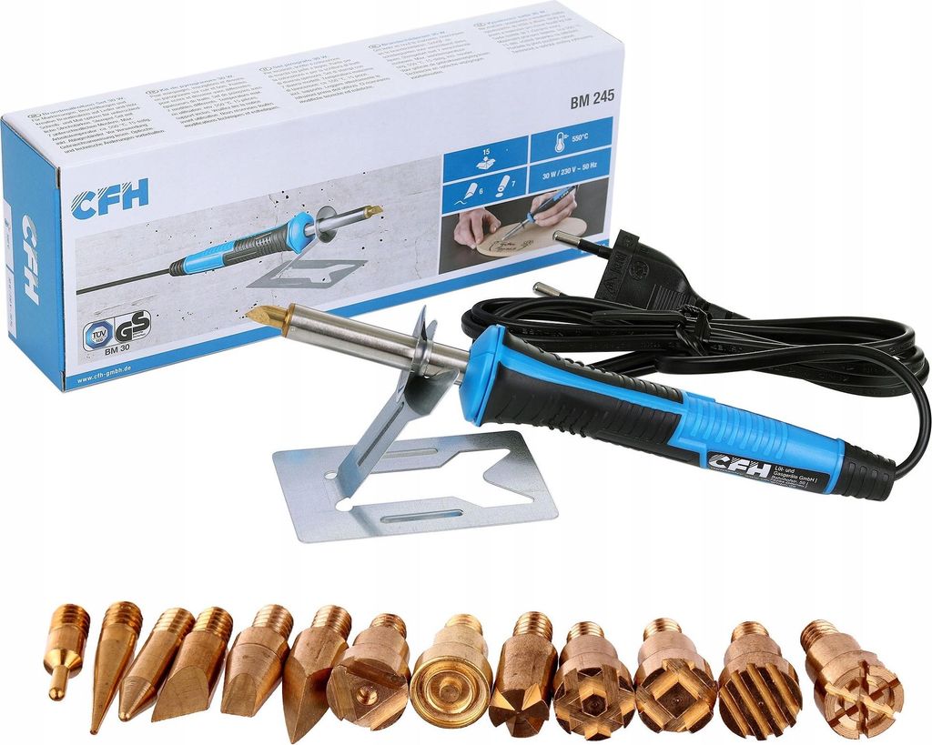 A product shot of a wood burning tool set, including the tool, its stand, and various interchangeable tips, along with its packaging.