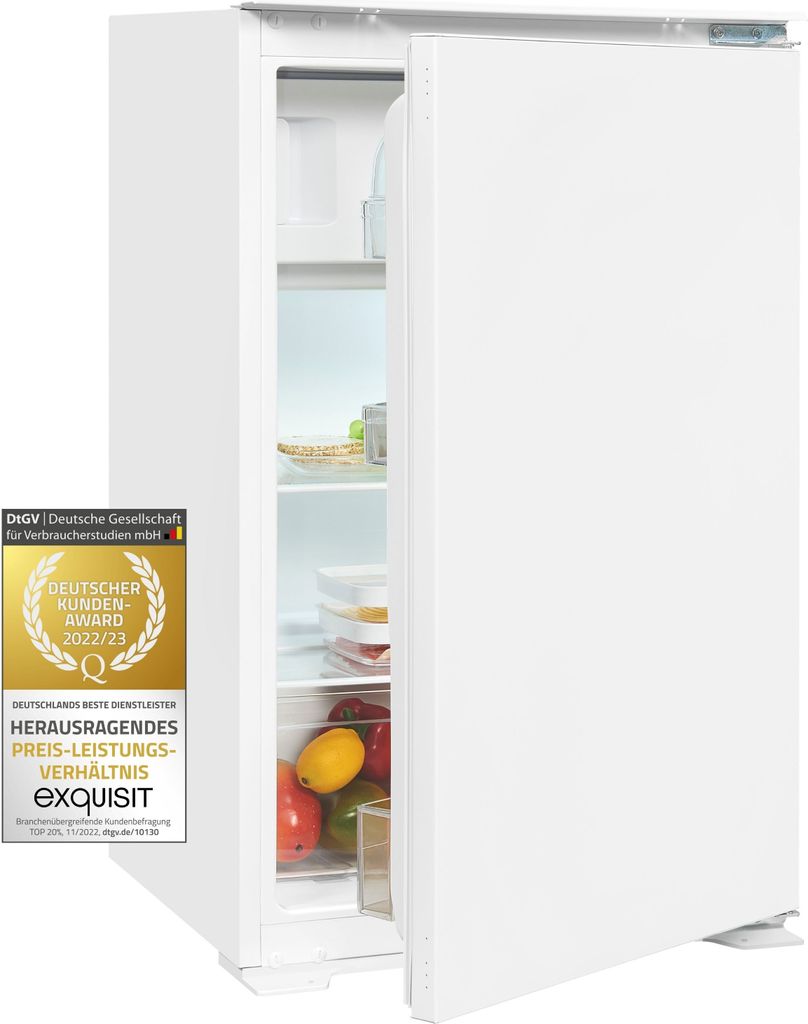 A white refrigerator with its door slightly ajar, revealing shelves stocked with fruits and containers. A seal of award is visible on the left side.