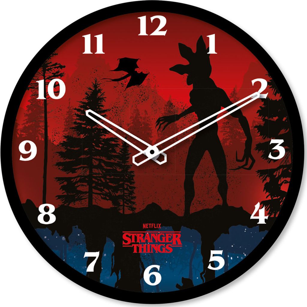 A wall clock with a Stranger Things theme, featuring a silhouette of the Demogorgon against a red, forest-like background.