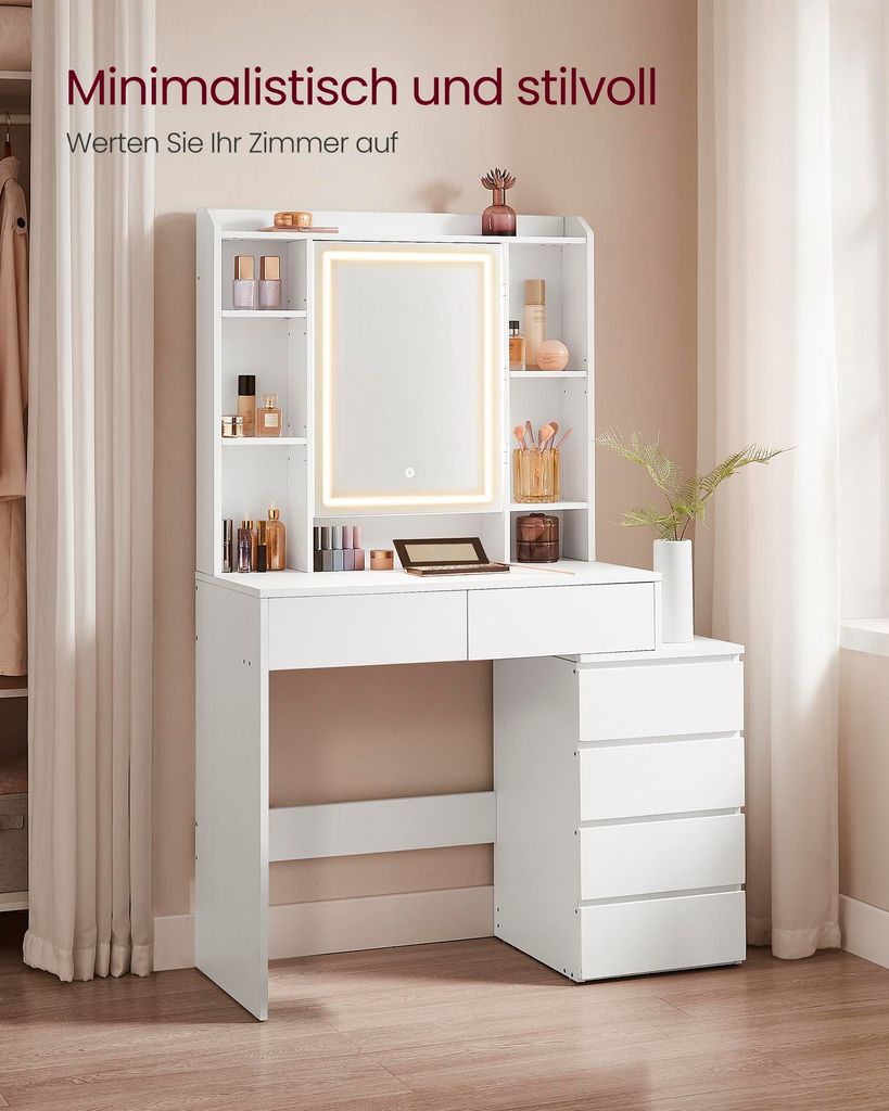 A white vanity table with a lighted mirror and shelves, displaying various cosmetic products.