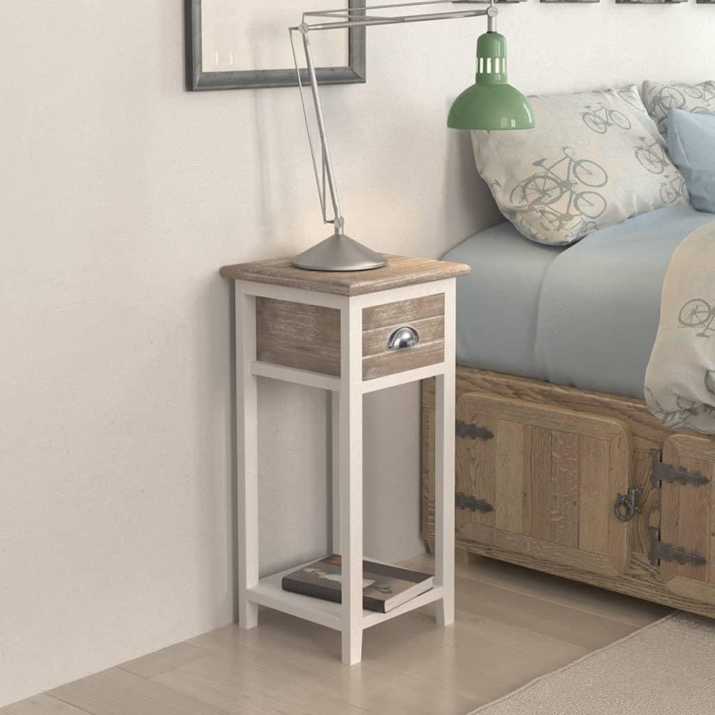 A bedside table next to a bed.