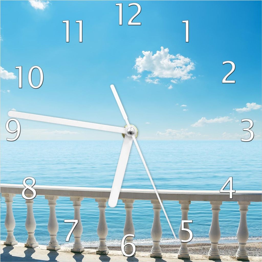 Wallario Design Wanduhr Weite Aussicht über ruhiges Meer aus Echtglas, Größe 20 x 20 cm