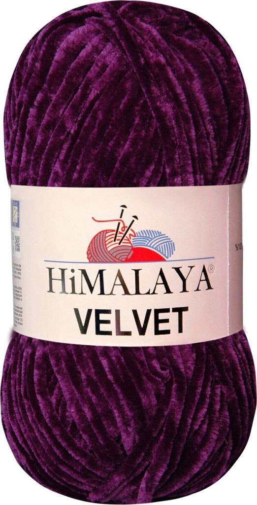 A ball of purple velvet yarn on a white background.