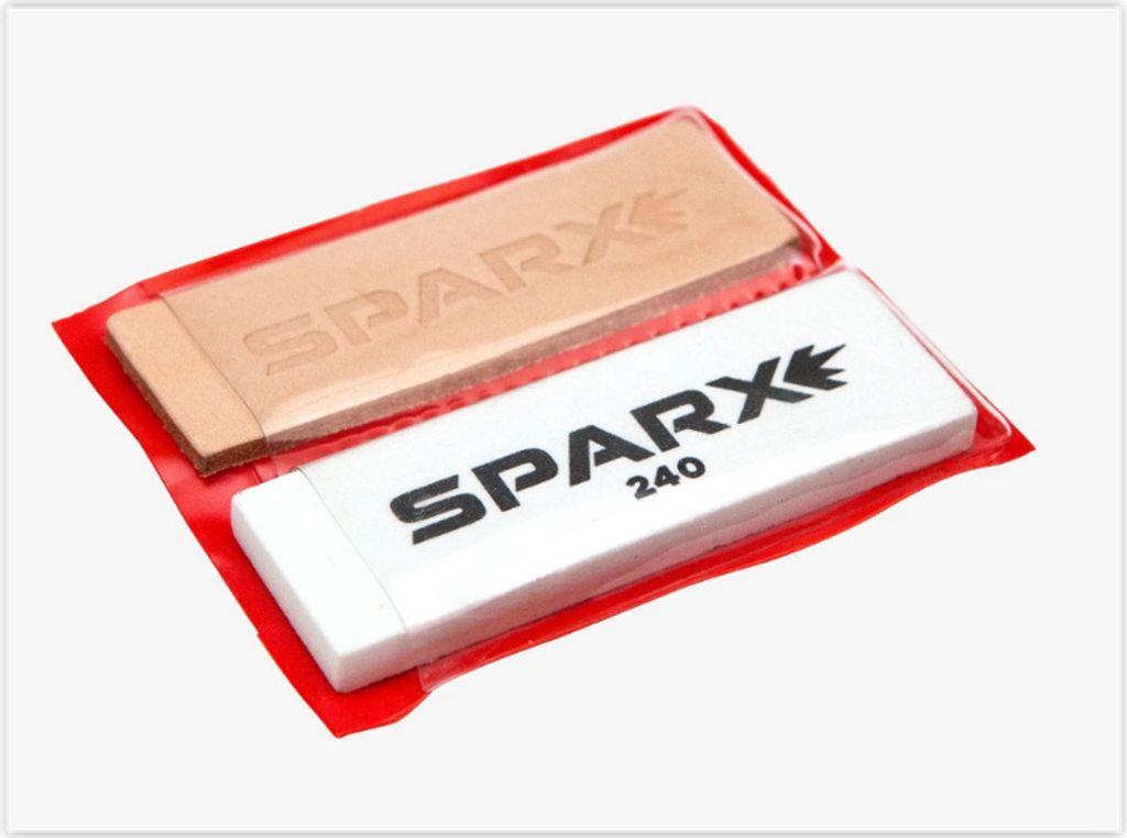 Two sharpening stones in plastic packaging.