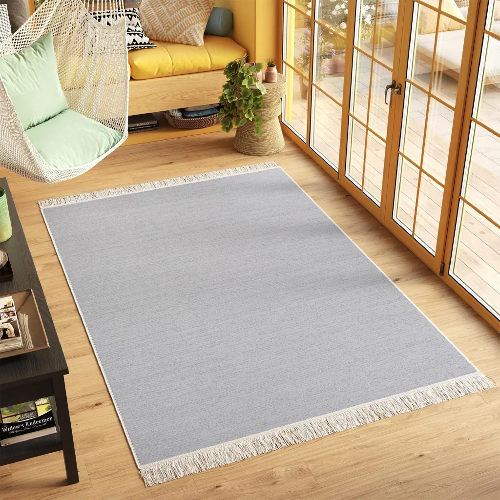 Tapis AZTECA gris uni 120 x 170 cm - Design épuré avec franges
