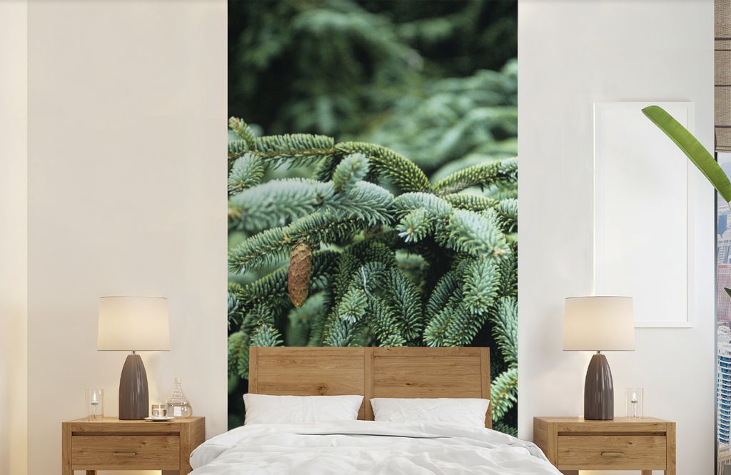 MuchoWow Fototapete für Wohnzimmer oder Schlafzimmer Wandtapete Vinyl Motivtapete Eine Nahaufnahme eines Weihnachtsbaums in einem Wald in den Ve...