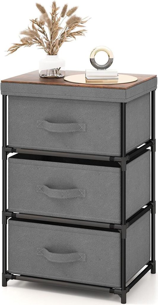 A three-drawer storage unit with a wooden top, decorated with a vase of dried flowers and a decorative object.