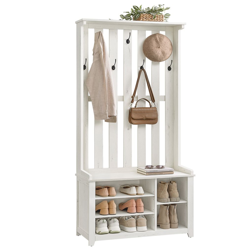 A white hall tree with a shoe bench and coat hooks, featuring a jacket, a handbag, a hat, and shoes.