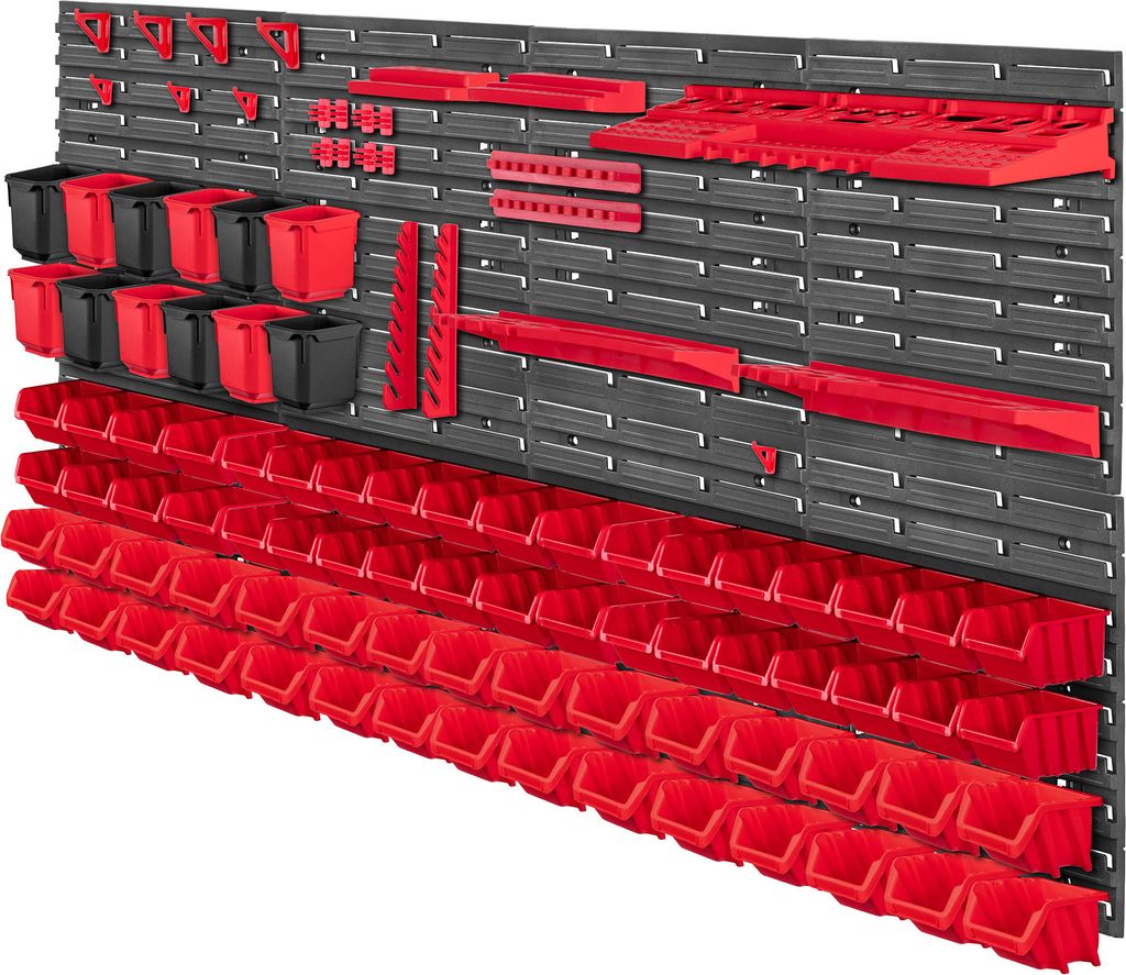 A wall-mounted tool organizer system with numerous red and black storage bins and various red tool holders.