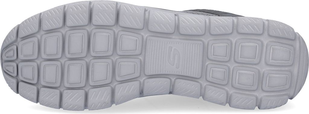 The underside of a gray shoe sole.