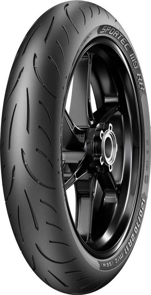 A motorcycle tire mounted on a wheel, shown against a white background.