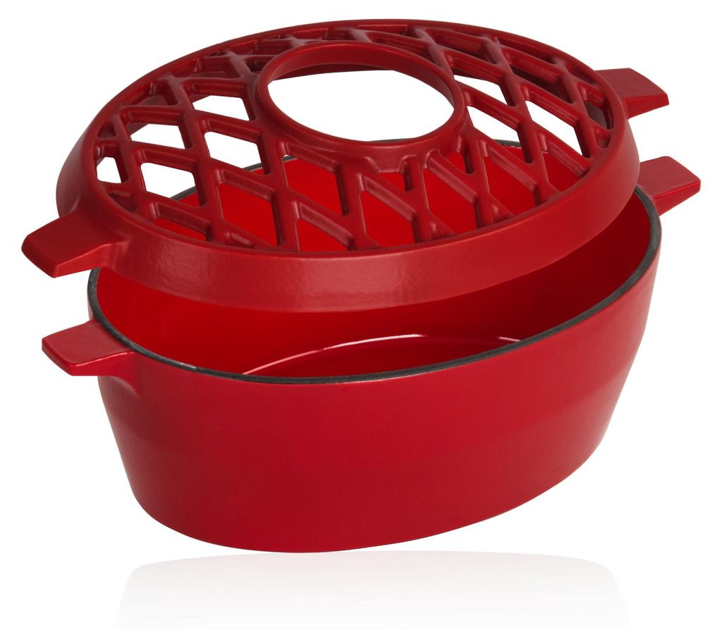 A red cast iron humidifier for a BBQ or oven.