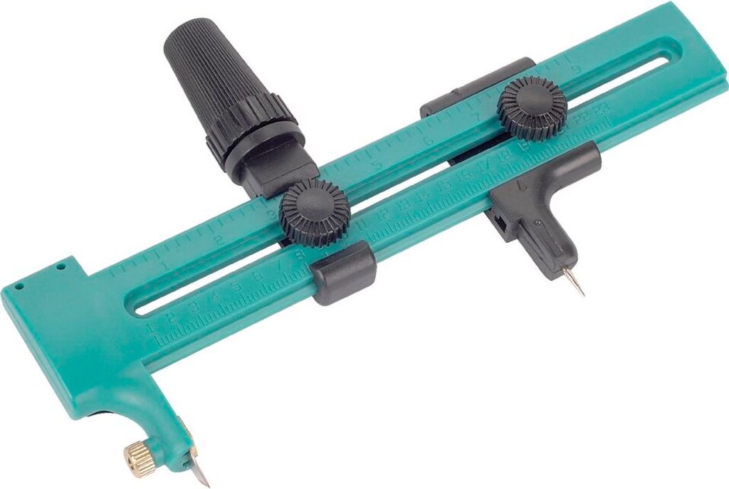 A teal and black circle cutter tool is shown against a white background.