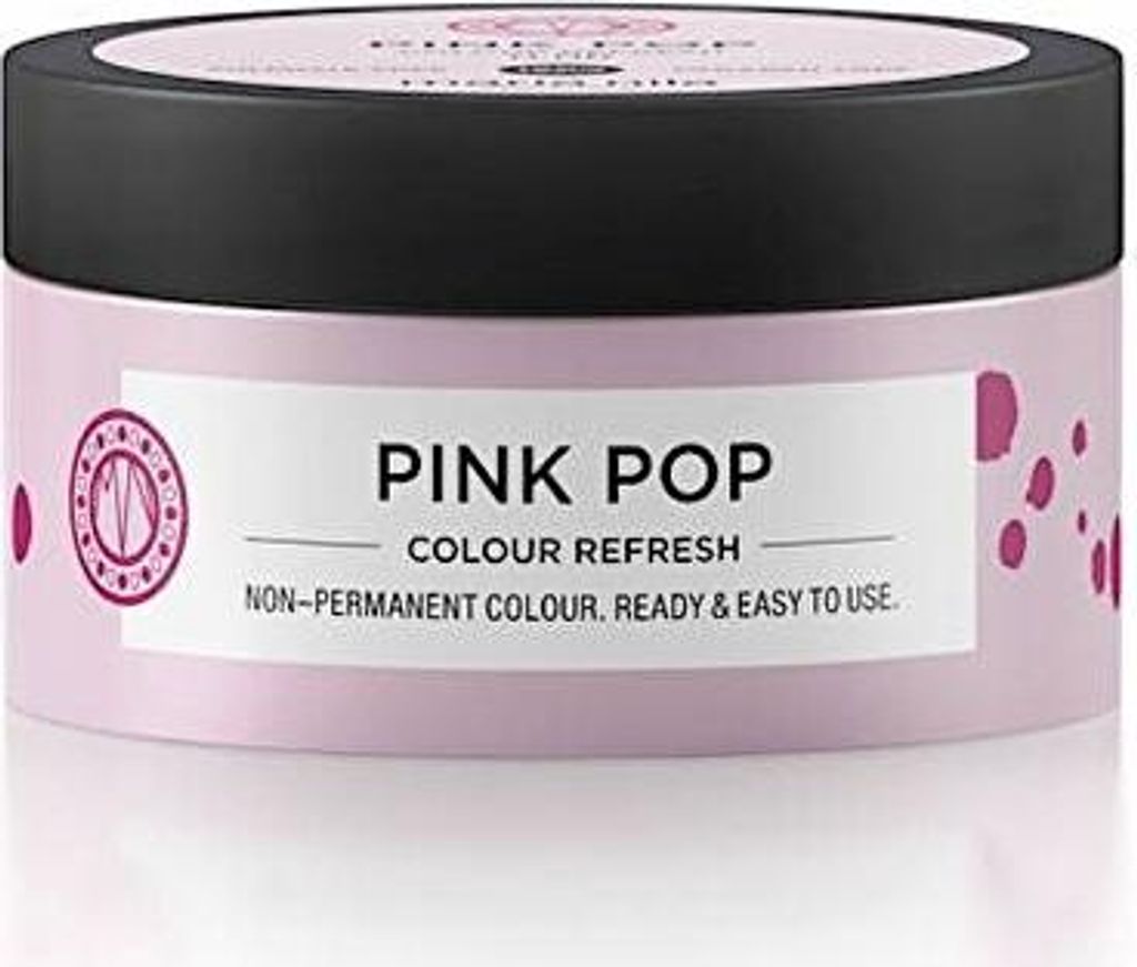 A pink jar of hair color refresh product with a black lid, set against a white background.