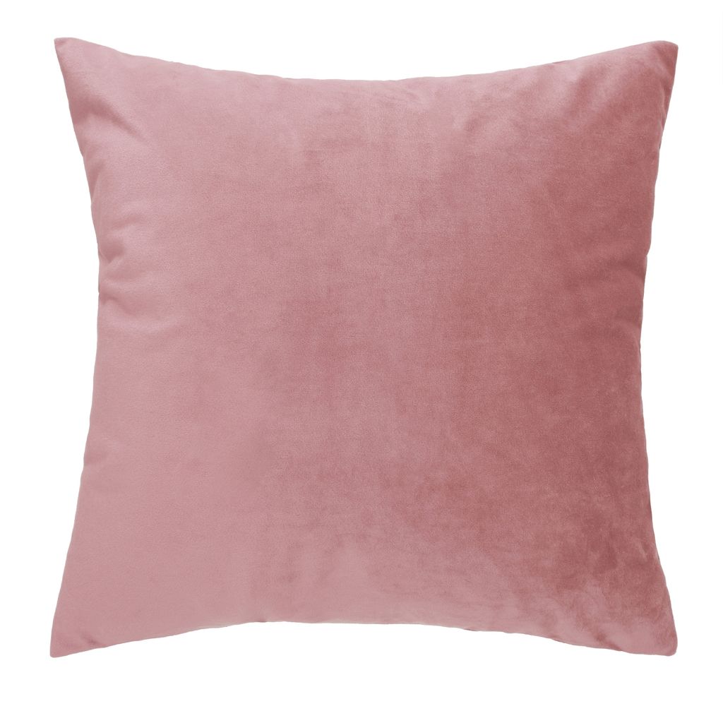 A single pink pillow on a white background.