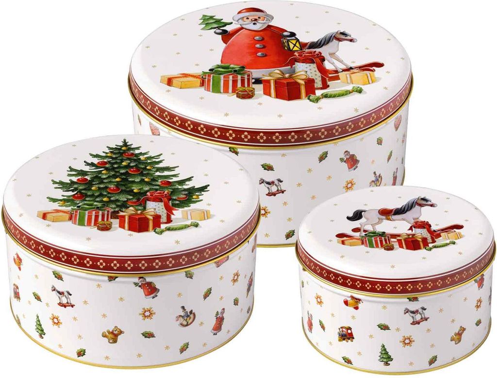 A set of three round Christmas-themed tin boxes.