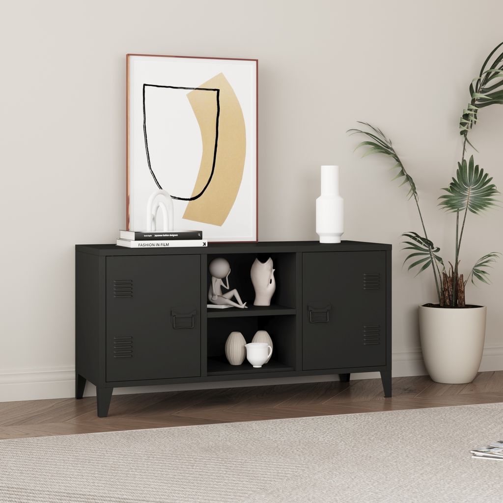 A black metal media console with decorative items and a plant in a pot.