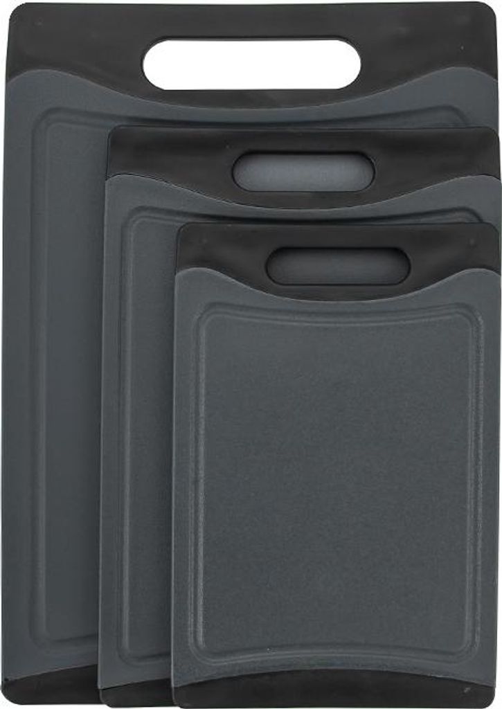 Three dark gray cutting boards of different sizes are stacked on top of each other.
