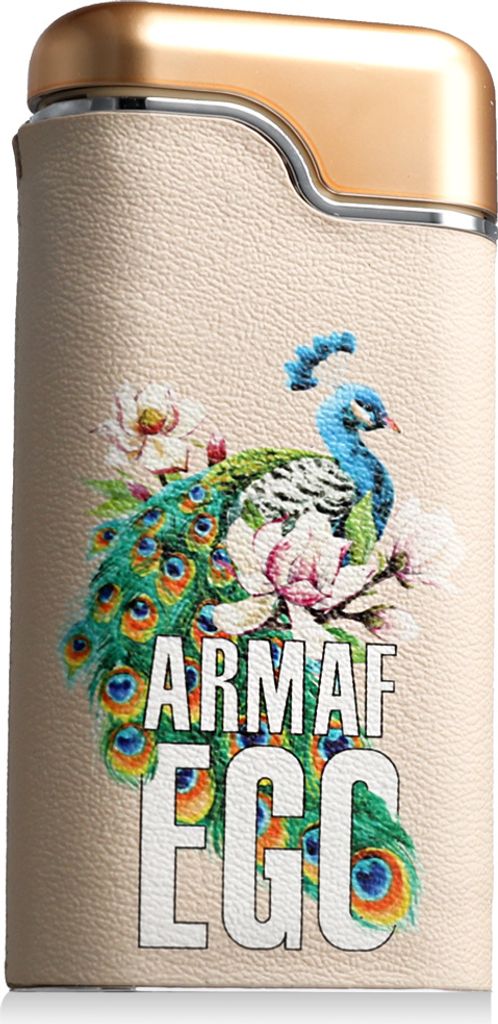 A close-up product shot of a perfume bottle with a peacock and floral design.