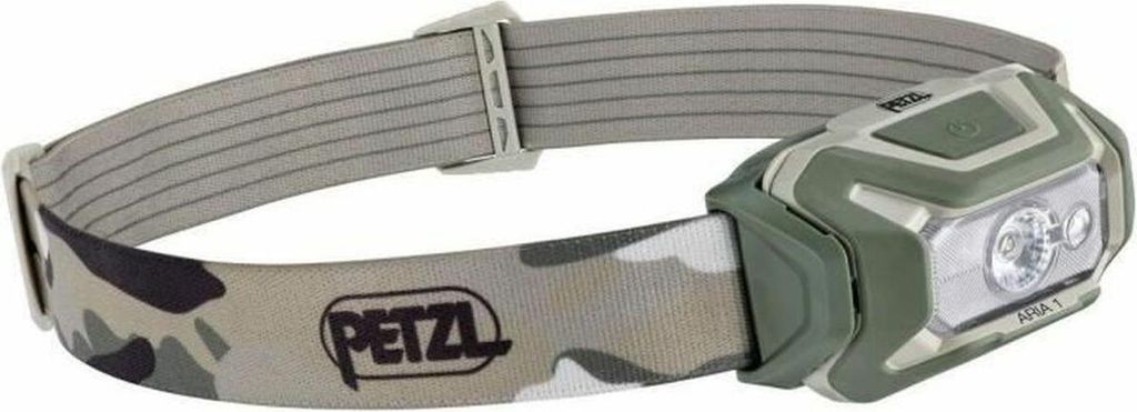A camouflage-patterned Petzl headlamp is shown against a white background.